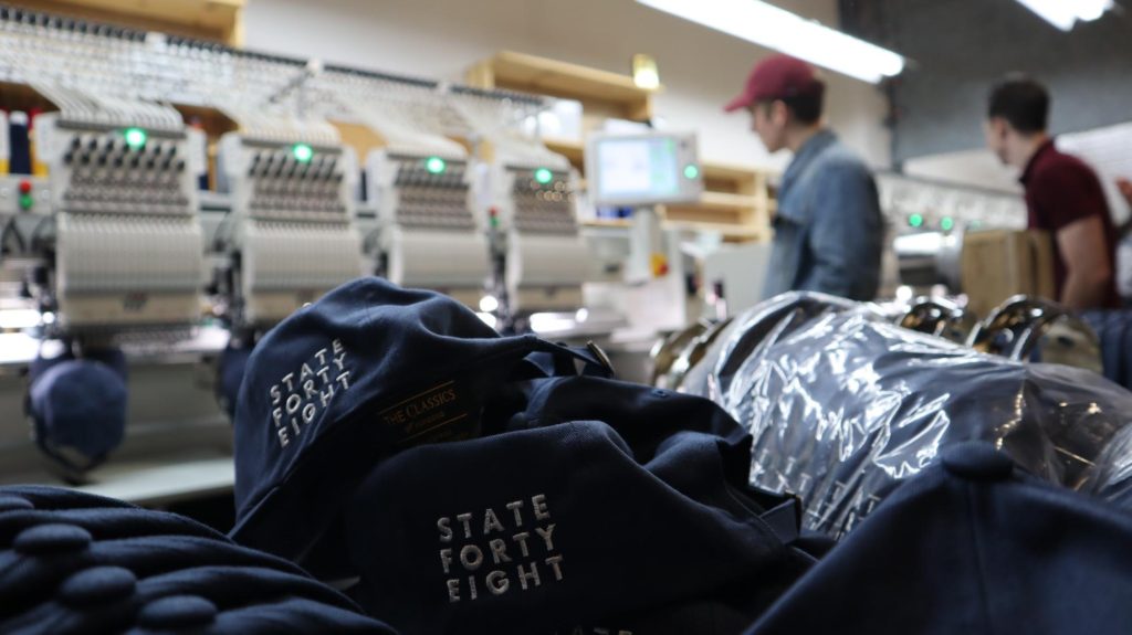 Close up of embroidered State Forty-Eight baseball caps